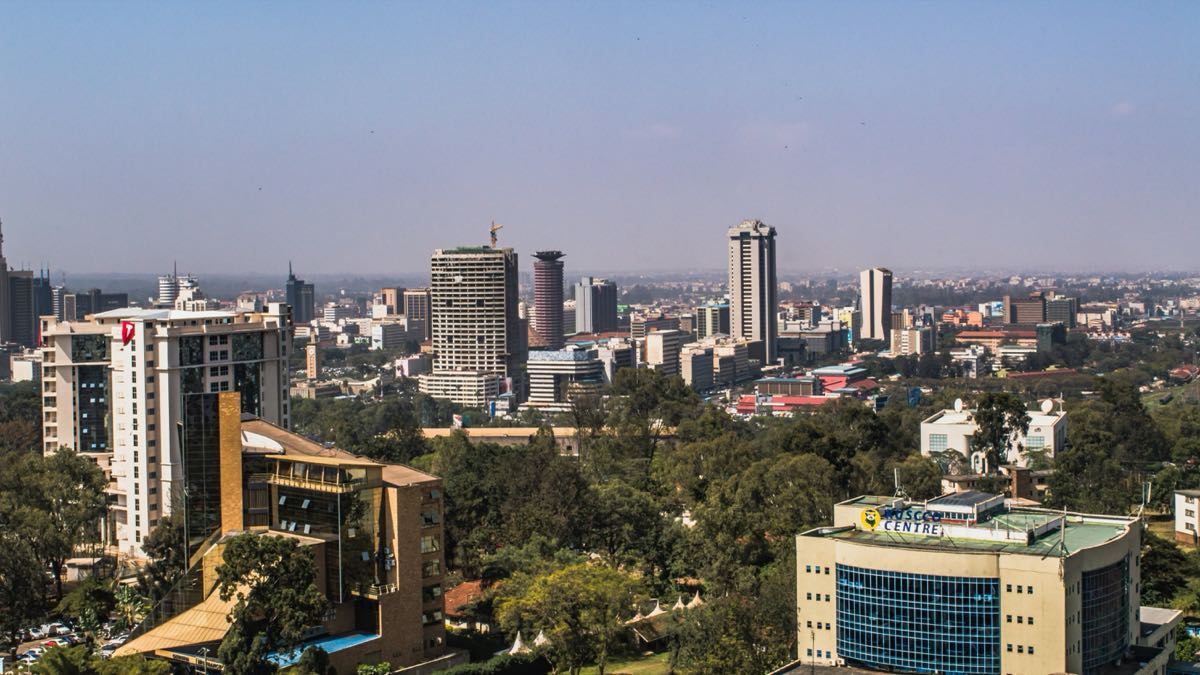 Nairobi city park with giraffe visible against the skyline