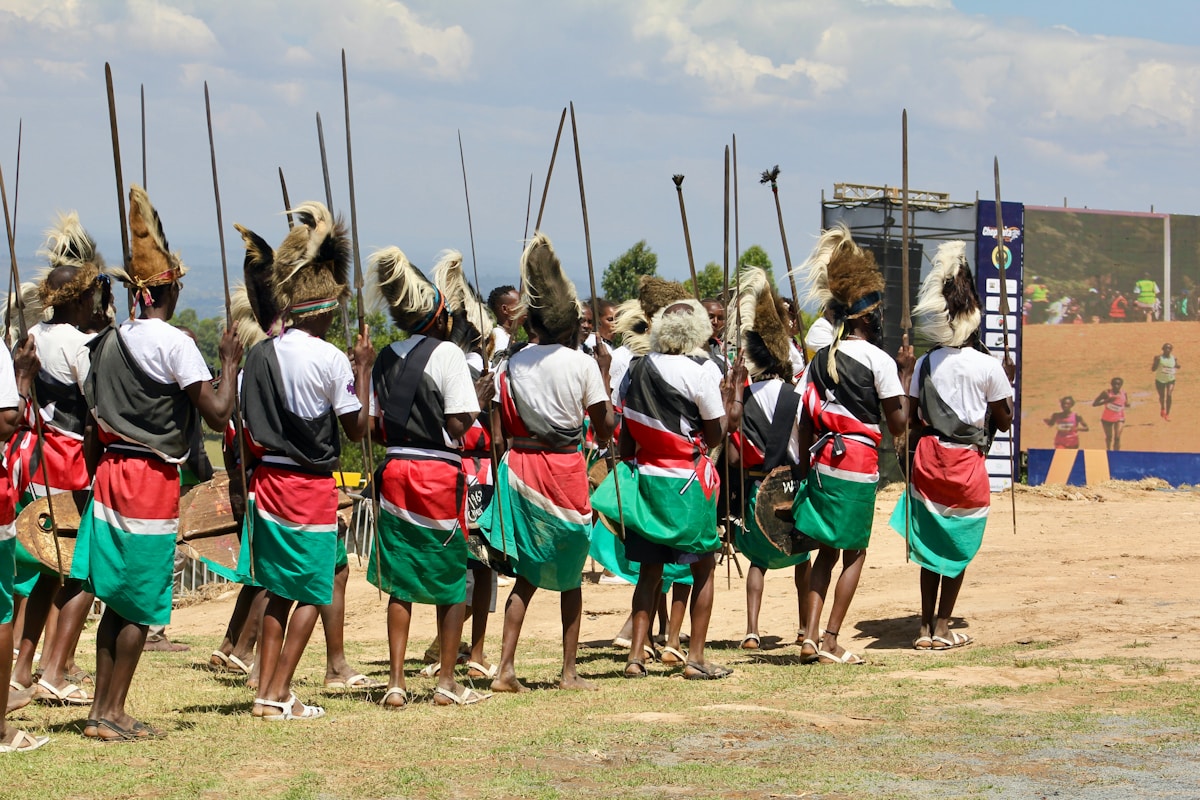 Kenyan warriors in traditional dress holding spears at a ceremony, Kenya
