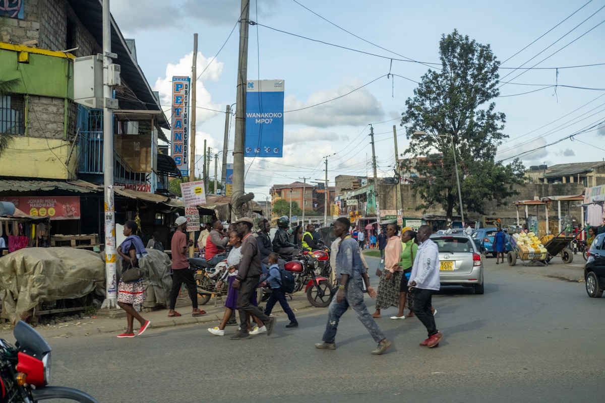 Busy street scene in Nairobi, Kenya with people and vehicles